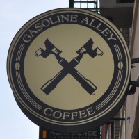 The Gasoline Alley Logo, crossed-espresso baskets