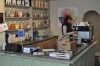 Yasmeen at work behind the counter at The Dry Goods Store