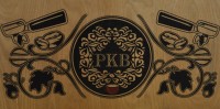The Pot Kettle Black logo, the letters PKB in a black circle over a red espresso cup, flanked by coffee beans and a pair of portafilters.