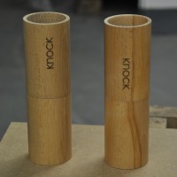 Two sets of wooden cylinders for Knock's feldgrind hand-grinders.