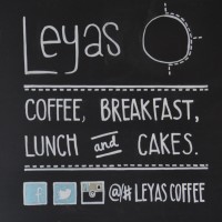 A chalkboard inside Leyas on Camden High Street, offering coffee, breakfast, lunch and cakes.