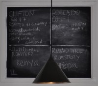 The coffee bean choices chalked up on the board behind the espresso machine at The Little Man Coffee Company in Cardiff (two espresso, two filter).