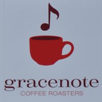 A drawing of a musical note, over a drawing of a coffee cup, over the words "gracenote | COFFEE ROASTERS", all in various shades of red.