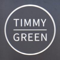 The Timmy Green logo from outside Timmy Green on Sir Simon Milton Square near Victoria Station.