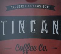 Detail from the sign outside of the Tincan Coffee Co branch on Clare Street, Bristol.