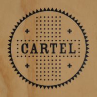 The Cartel Coffee Lab logo from the wooden A-board outside the store in downtown Phoenix.