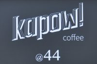 Details from the sign in the window of Kapow! Coffee at 44 The Calls in Leeds.