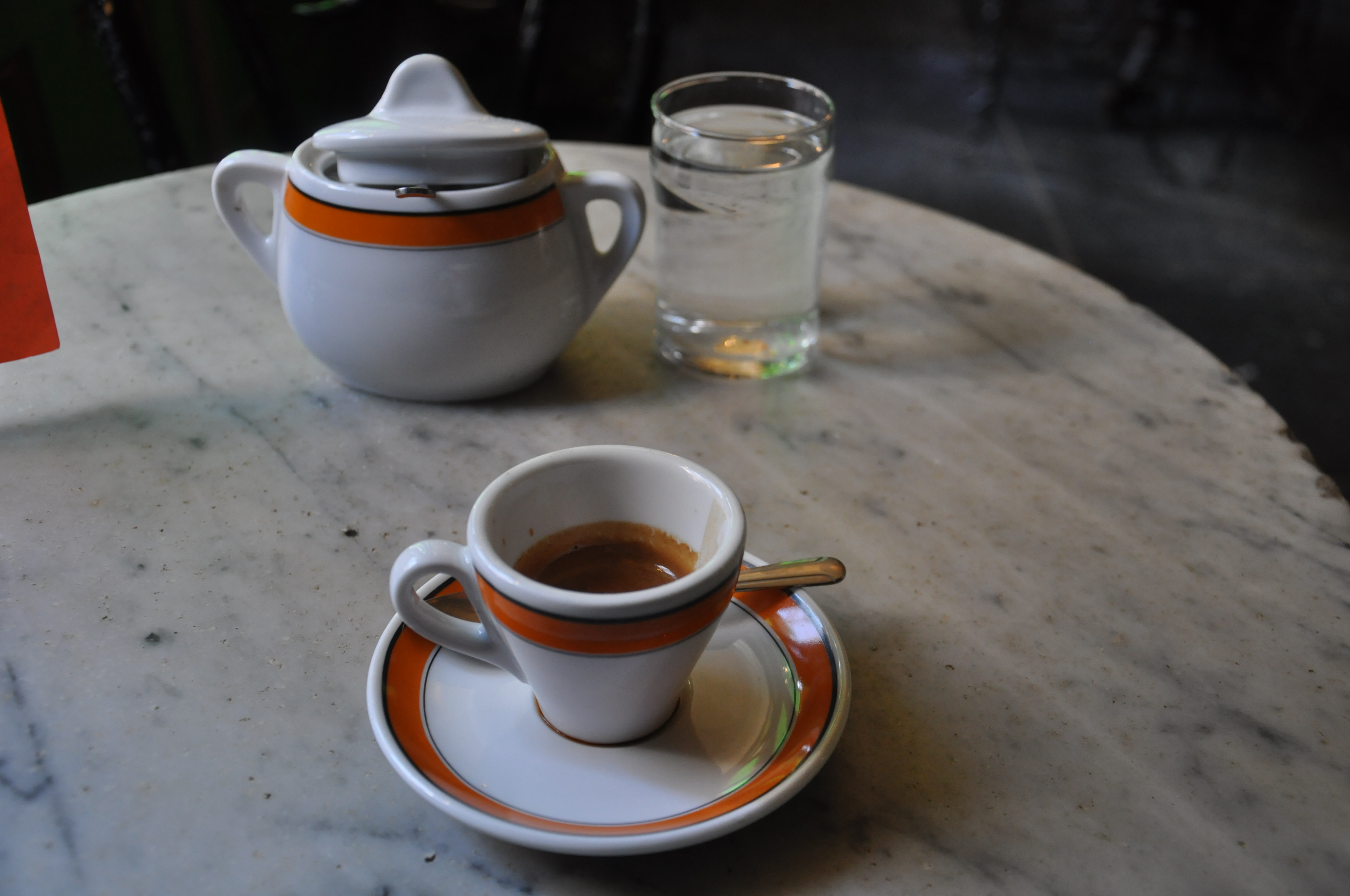 Espresso, served with a glass of water, naturally Brian's Coffee Spot