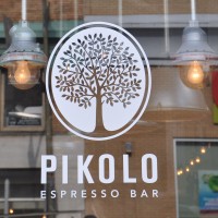 The Pikolo Espresso Bar, with it's logo of a tree in the window on Park Avenue, Montreal
