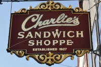 Charlie's Sandwich Shoppe sign hangs proudly over the sidewalk on Columbus Avenue