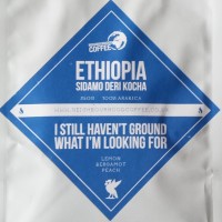 The label from Neighbourhood Coffee's Ethiopia Sidamo Deri Kocha single-origin coffee, with the catchy name "I Still Haven't Ground What I'm Looking For".