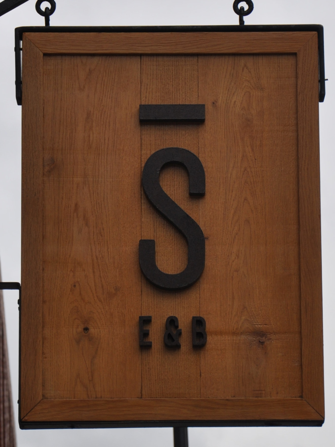 The minimalist sign for Stage Espresso and Brewbar, hanging outside on Oxford Row.