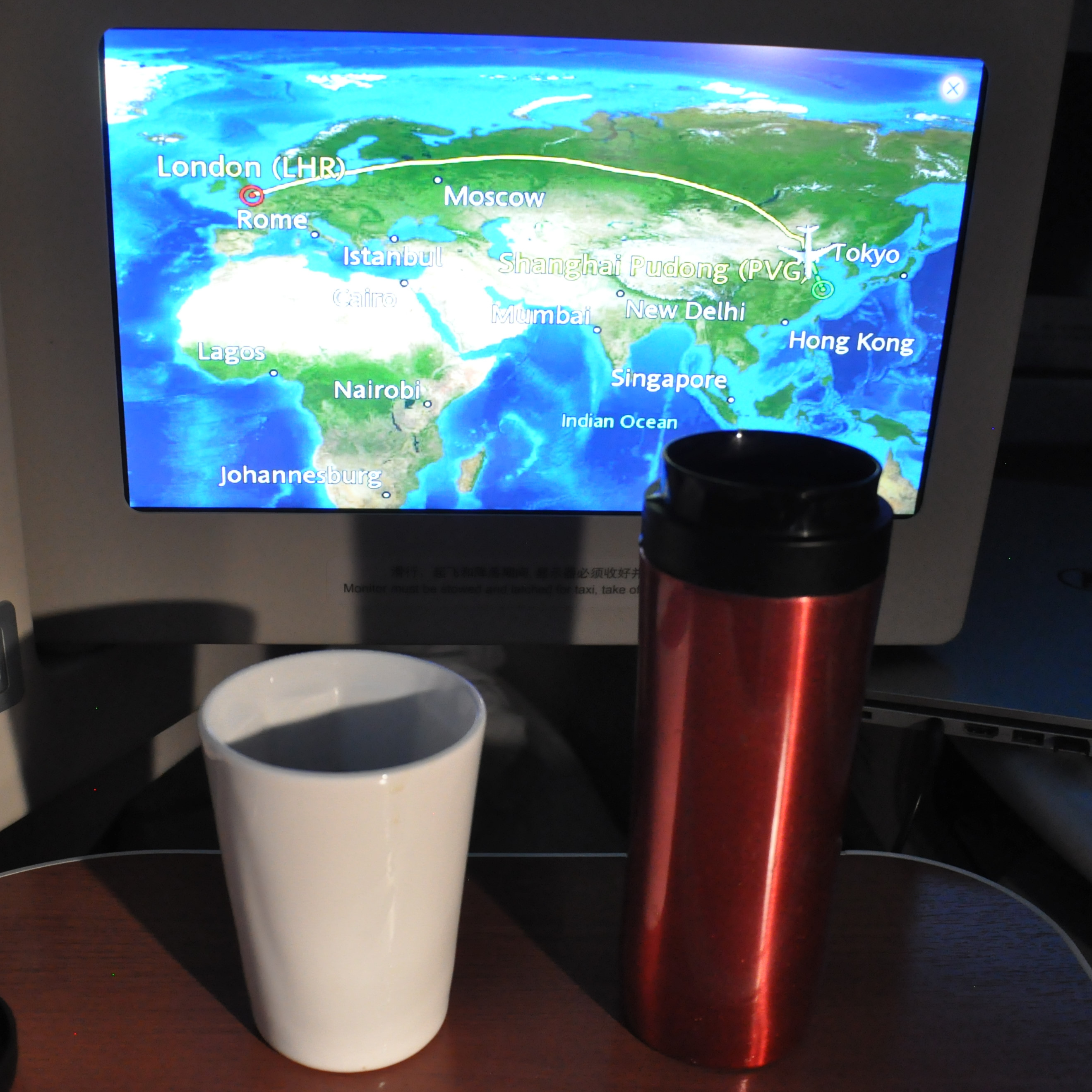 Celebrating a successful flight in business class with China Eastern to Shanghai with some coffee made in my Travel Press and served in my Therma Cup.