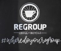 The Regroup Coffee + Bicycles logo, along with its slogan #wheredoyouregroup