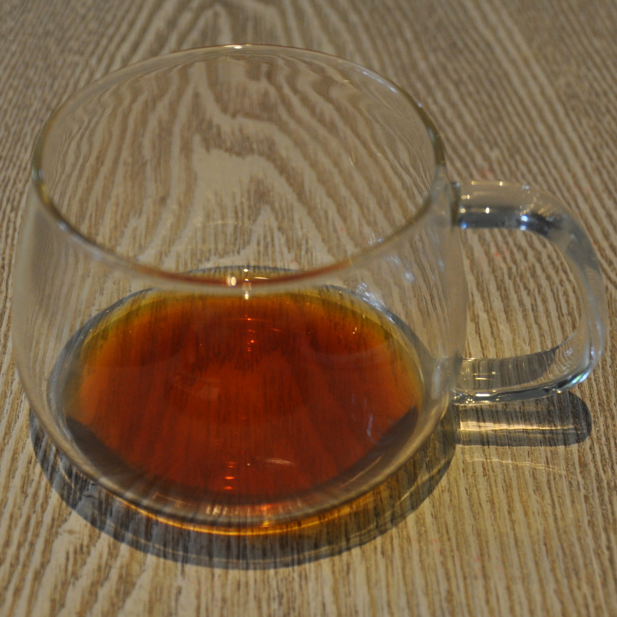 The remains of my single-origin Kenyan pour-over in a glass mug, as served in Blue Bottle in the Aoyama district of Tokyo.