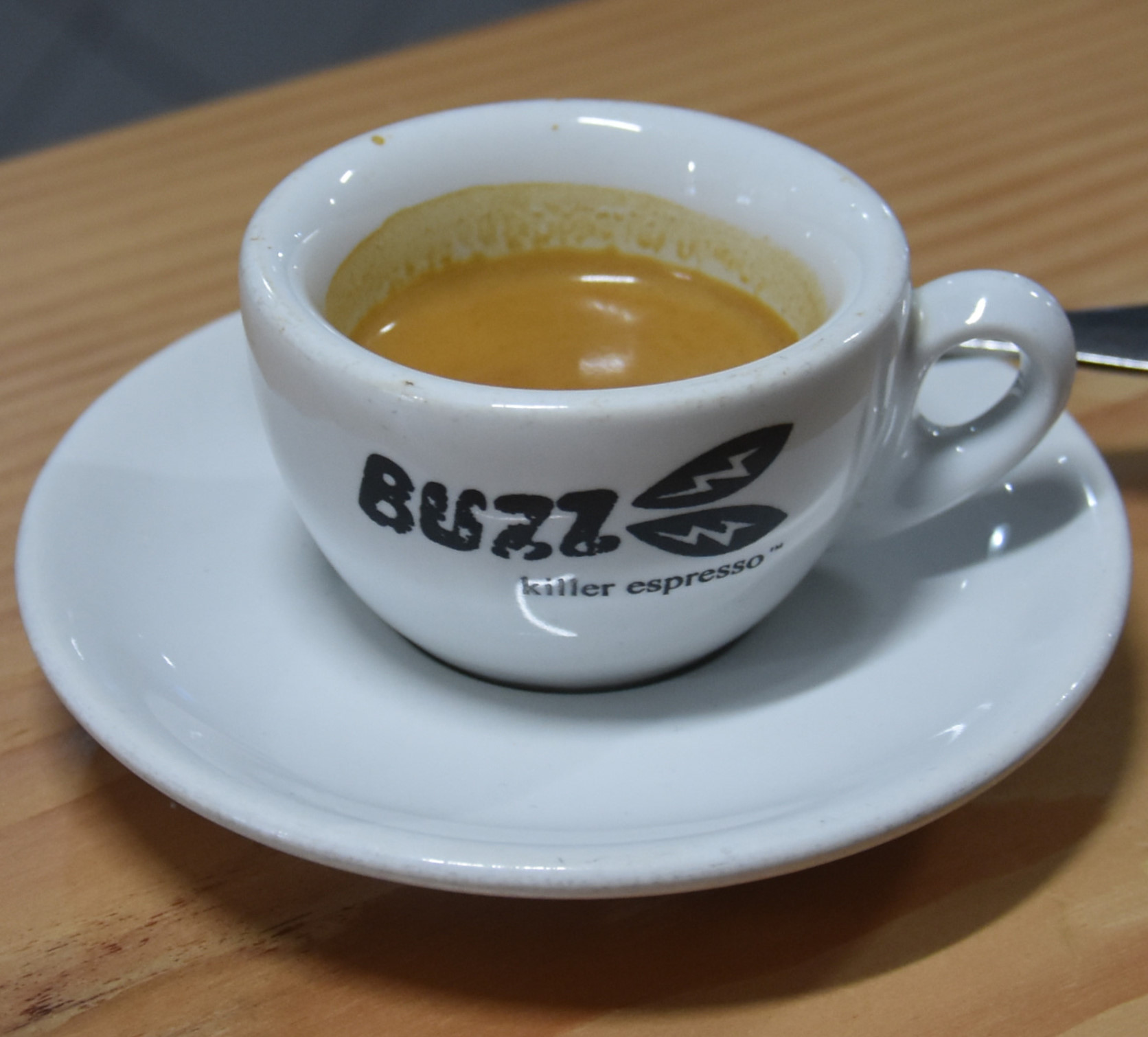 A lovely shot of espresso in an old Buzz Killer Espresso cup, made with the NCK blend at Buzz Coffee & Baker.