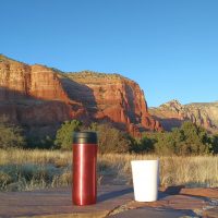 My Espro Travel Press and ThermaCup admire the scenery in Red Rock Country, south of Sedona, Arizona. From the cover of the 2019 Coffee Spot Calendar.