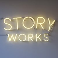 The sign says it all: "Story Works", from the wall of Story Works by Clapham Junction.