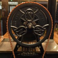 Details of the main drive wheel of the 100 year old, fully working Uno coffee roaster at Atkinsons in Mackie Mayor in Manchester.