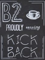 "B2 PROUDLY serving KICK BACK", taken from the board outside B2 in San Pedro Square Market.