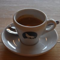 An El Salvador single-origin espresso from Clifton Coffee Roasters in a classic white espresso at Big Bad Wolf Coffee.