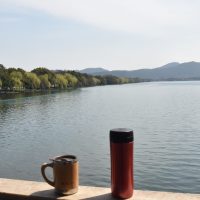 My coffee, in the shape of my Global WAKEcup and Espro Therma Pres, overlook the West Lake in Hangzhou from the Fair Rainbow Bridge on a recent trip to China.