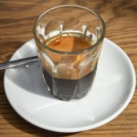 What’s The Story?, a washed Ethiopian single-origin espresso from Wegida in Yirgacheffe, served in a glass at the Department of Coffee and Social Affairs Paddington Central branch.