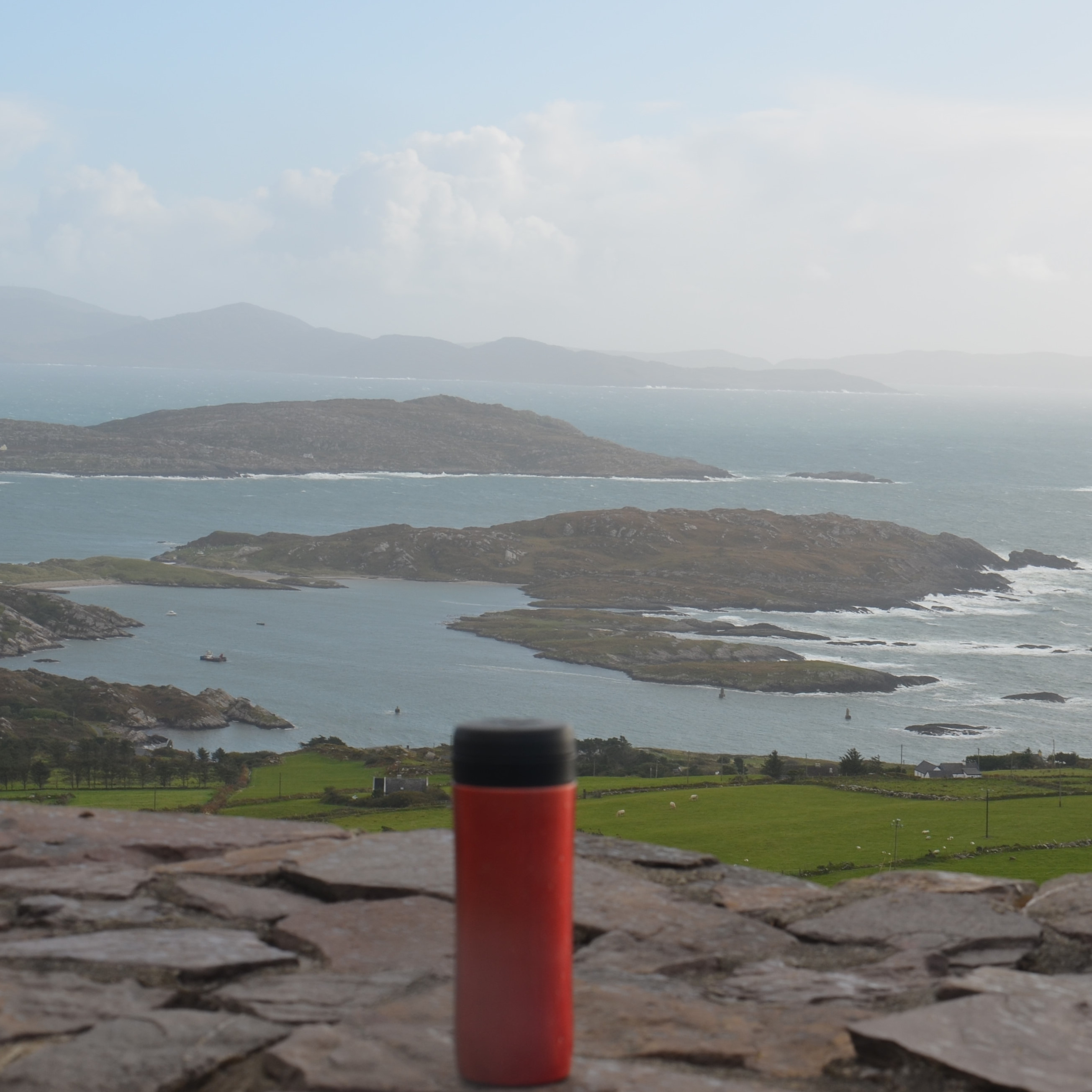 My Travel Press, at a stop on the southern part of the Ring of Kerry, overlooking Abbey Island with the Lambs Head headland beyond that, and, in the far distance, the Bere Peninsular.
