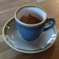A classic espresso (Ground Coffee Society's Caveman blend) in a classic cup, served at 139 Coffee.