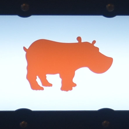 The Kiss the Hippo logo, an orange hippopotamus in silhouette.