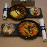 Amtrak's new "contemporary" menu on its Viewliner sleeper services: prepacked meals, delivered in a paper bag, a far cry from the full service dining cars it replaced. Bottom, my vegan Asian noodle bowl, and top, Amanda's red wine braised beef.
