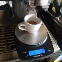 My daily espresso, being pulled into the Coffee Spot cup on my Sage Barista Express, while my Bonavita scales weigh and time the shot.
