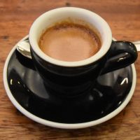 My espresso, made with Square Mile's Red Brick blend, and served in a classic black cup at Kaffeine on Great Titchfield Street.