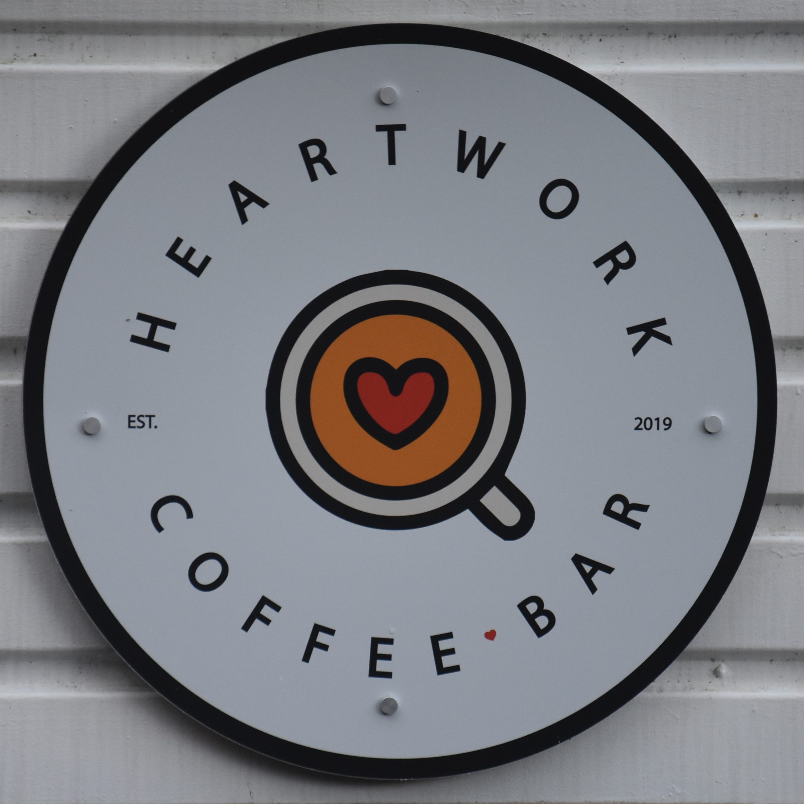The Heartwork Coffee Bar logo from the side of the horsebox which acts as the coffee bar.