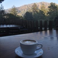 Enjoying a flat white at the Big Sur bakery, looking out over the mountains of the Santa Lucia Range in January 2017.