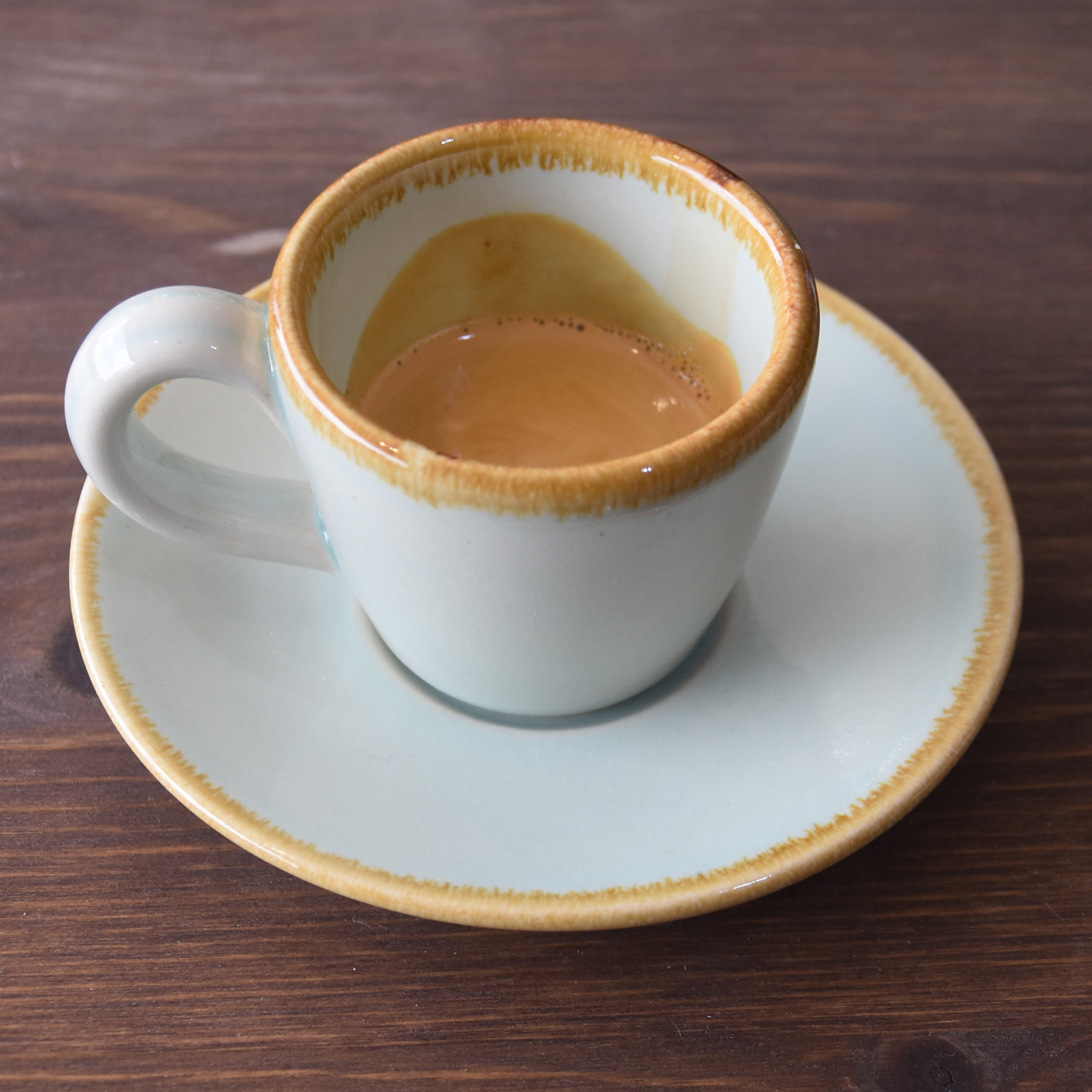A classic espresso in a handmade cup from Surrey Ceramics, served at The Hideaway in Guildford.