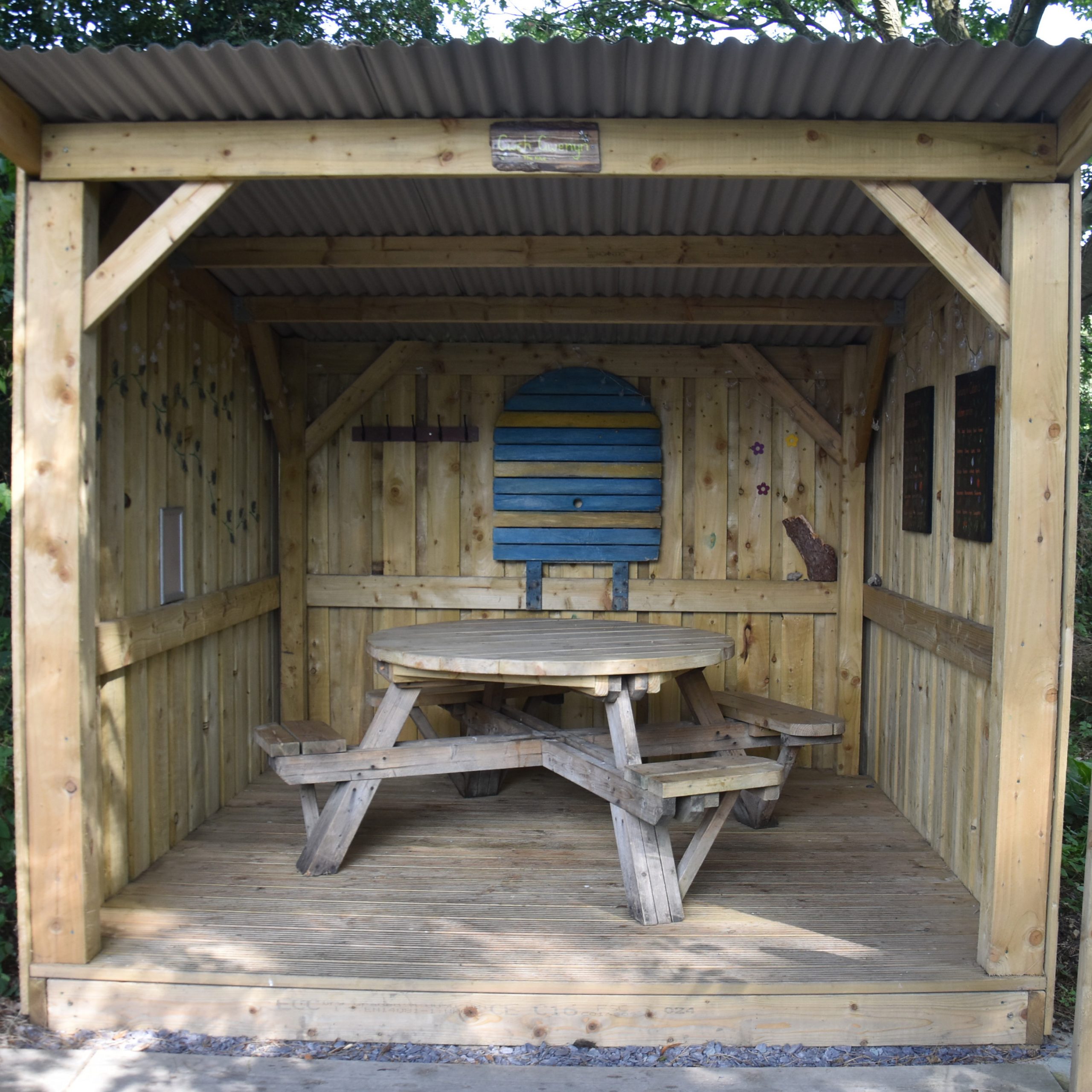 One of the cabins, known as Cwch Gwenyn (The Hive), in the garden at the back of Caffi Caban.