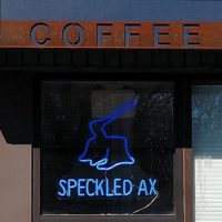 The sign over the door, proclaiming "COFFEE" at Speckled Ax, Walton Street.