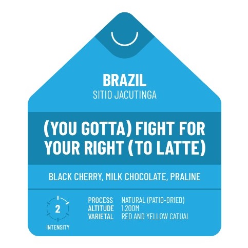 Detail from the label to Neighbourhood Coffee's Brazil Sitio Jacutinga: "(You Gotta) Fight For Your Right (To Latte)", witth tasting notes of black cherry, milk chocolate and praline. The coffee is naturally-processed (patio-dried) and consists of red and yellow catuai varietals grown at 1,200m altitude.
