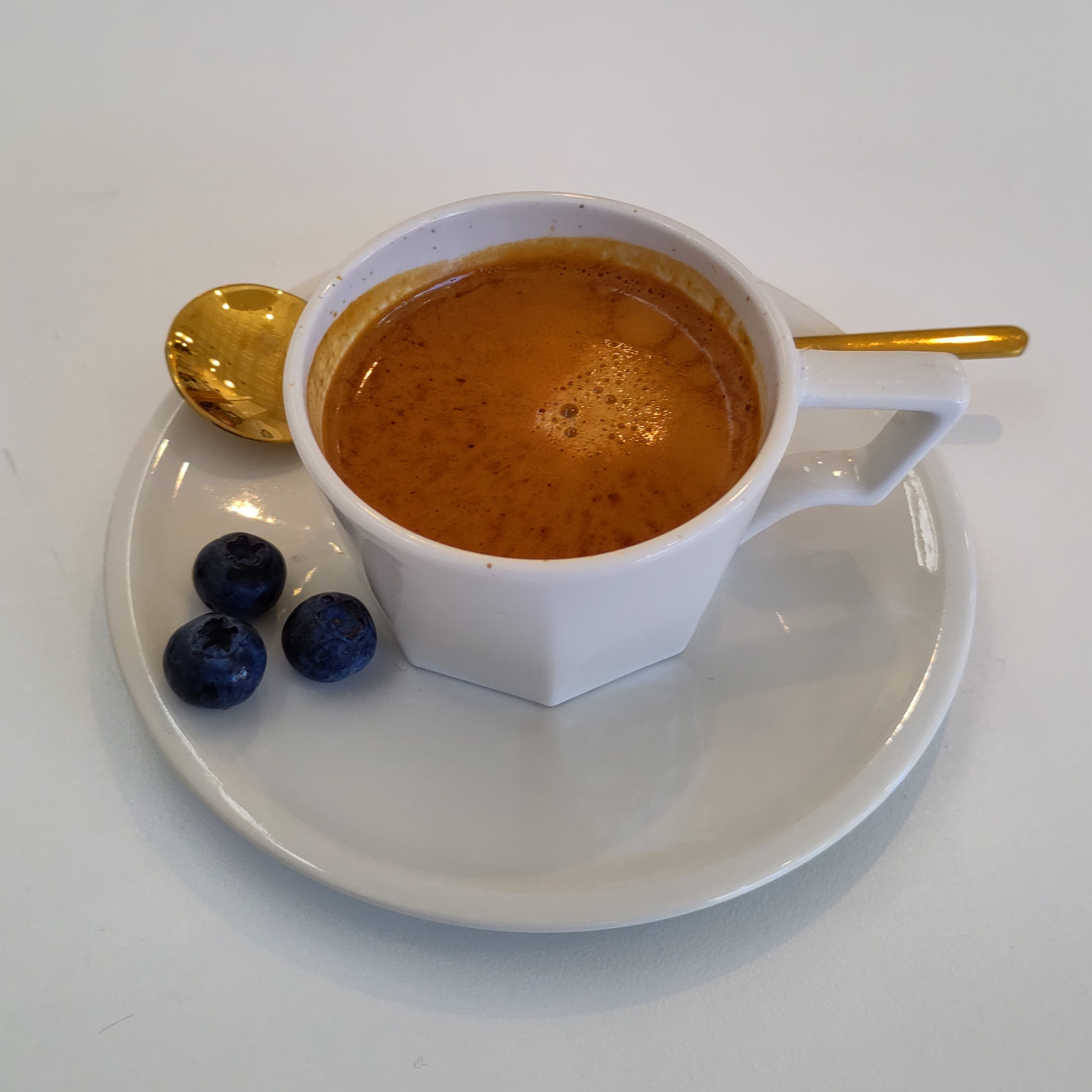 My espresso, a washed Colombian from Black & White Coffee Roasters, served in an interesting cup at Spro Coffee Lab in San Francisco, along with three blueberries as palate cleansers.