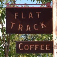 Pointing the way to good coffee, the sign outside Flat Track Coffee in Austin.