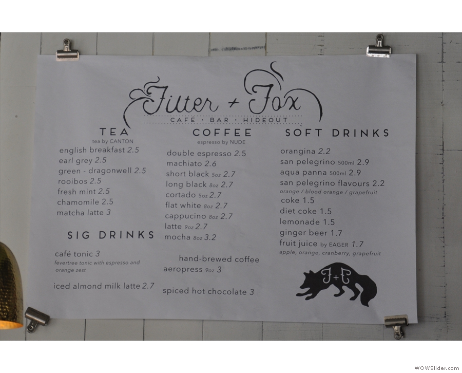 ... while the drinks menu is printed out and clipped up next to it.