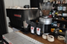 The espresso machinie is at the far end of the counter...
