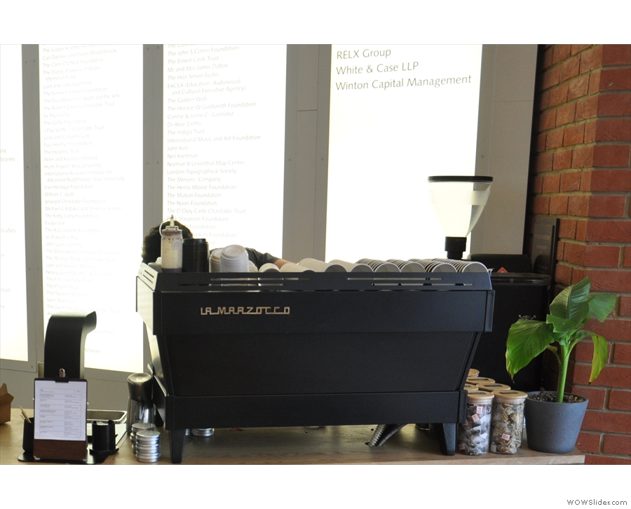 The espresso end of the espresso bar, plus hot water dispenser for filter coffee/tea.