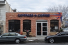 Compass Coffee on Washington DC's NW 7th Street. From the outside, it looks quite small...