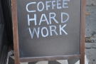 Enigmatic A-board, or a simple statement of the barista's life?