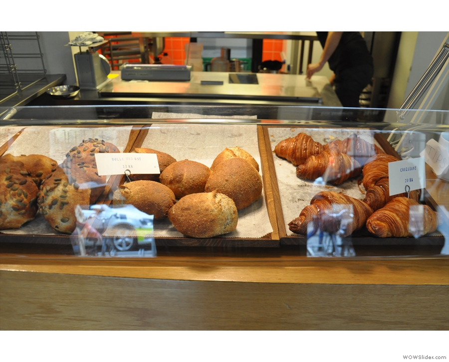 ... as well as bread rolls and more pastries, all made in the kitchen behind the counter.