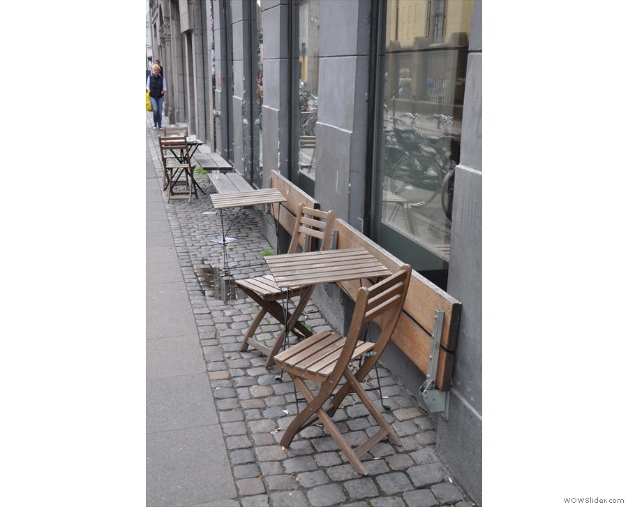 There's outside seating, with table for each window...