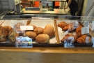... as well as bread rolls and more pastries, all made in the kitchen behind the counter.