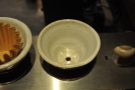 Sumerian uses these cone filters, which take Kalita Wave papers, but only have one hole.